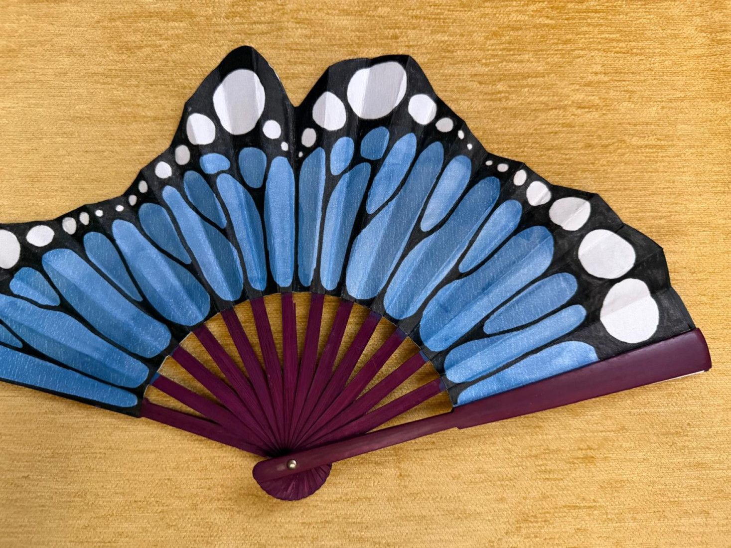 Abanico ala mariposa azul